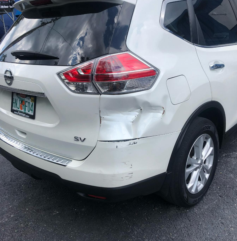 Nissan Rogue quarter panel damage - Citrus Park